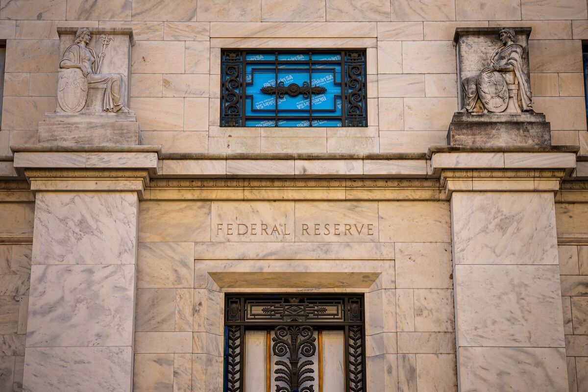 Fed holds rates steady, signals patience on cuts as services inflation stays sticky